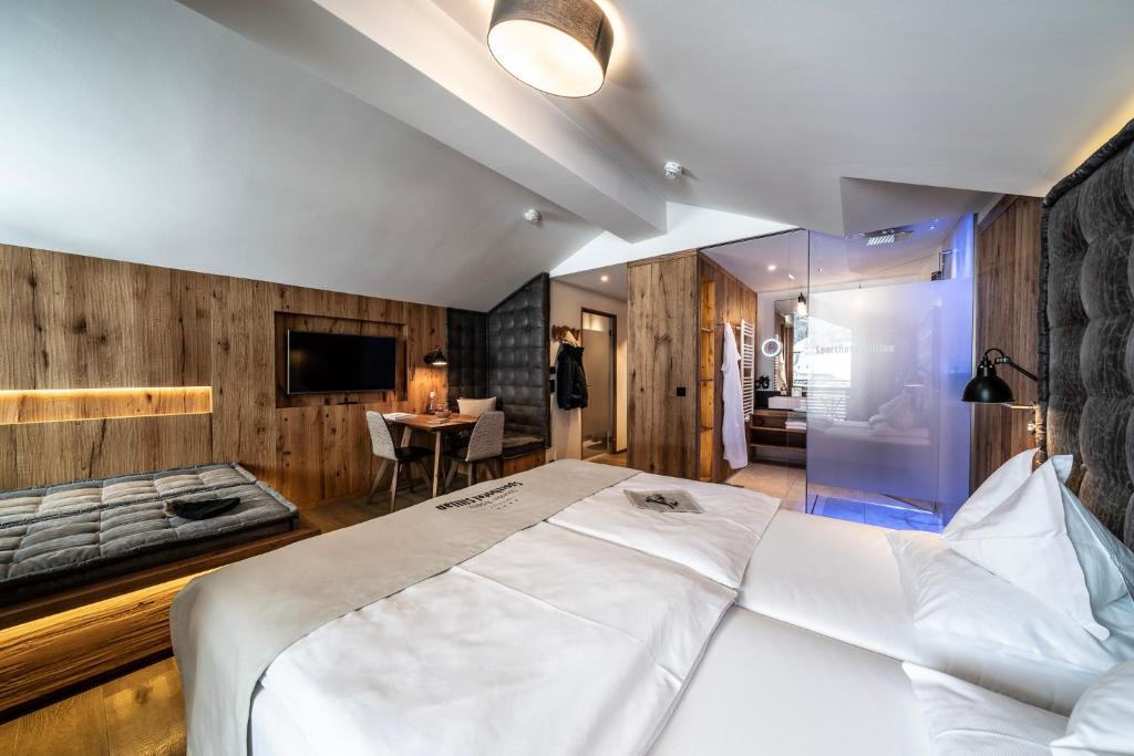 Posteľ alebo postele v izbe v ubytovaní Dolomiten Residenz - Sporthotel Sillian