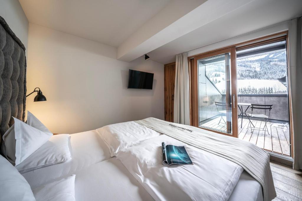 Posteľ alebo postele v izbe v ubytovaní Dolomiten Residenz - Sporthotel Sillian