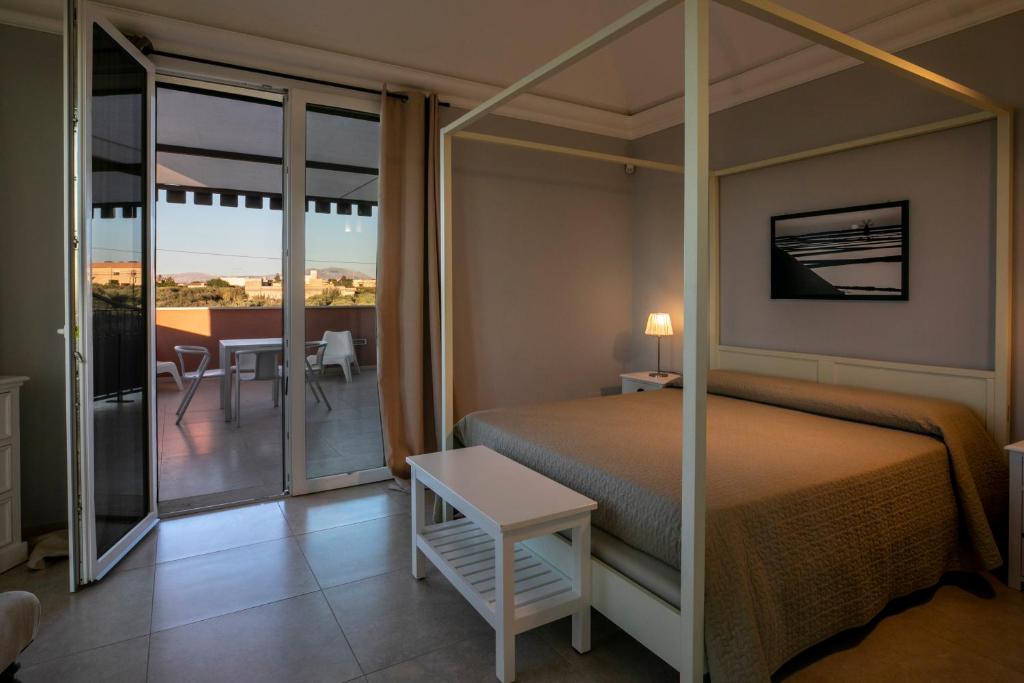 Postel nebo postele na pokoji v ubytování Corte Olea Resort