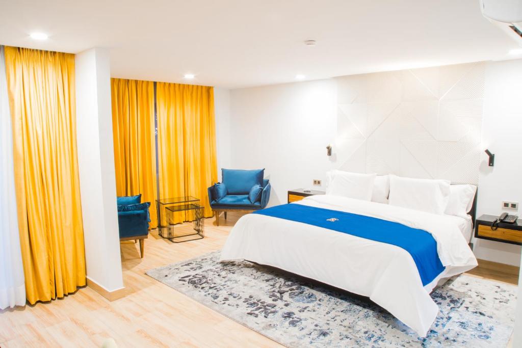 Postel nebo postele na pokoji v ubytování Ramë Hotel Boutique
