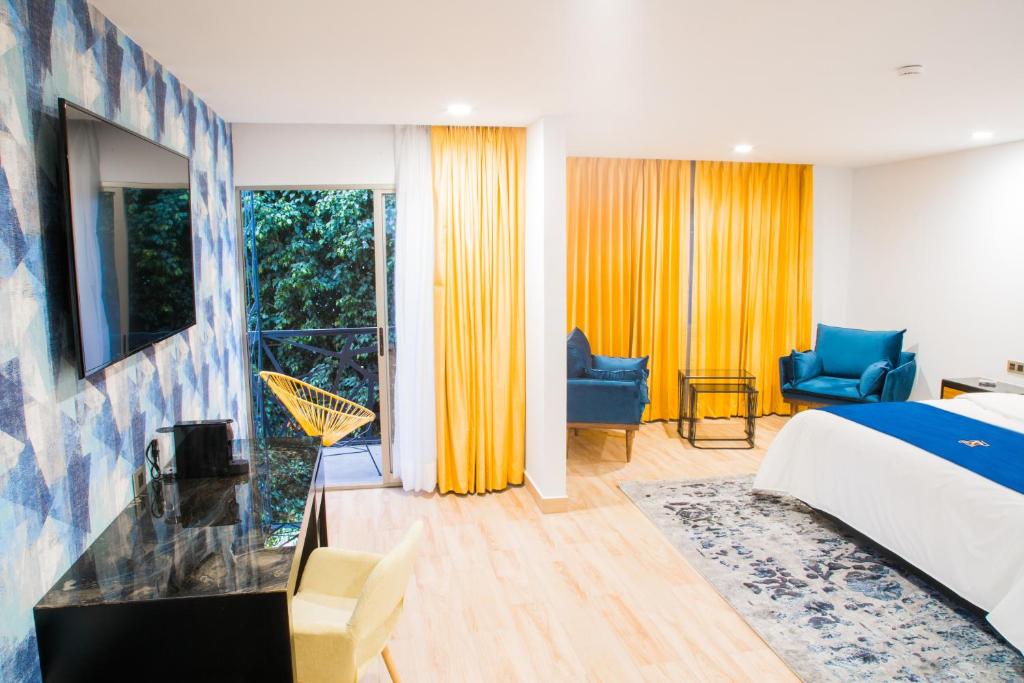 Postel nebo postele na pokoji v ubytování Ramë Hotel Boutique