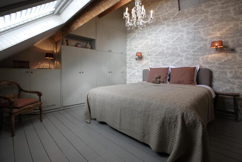 Postel nebo postele na pokoji v ubytování Guesthouse Alizée
