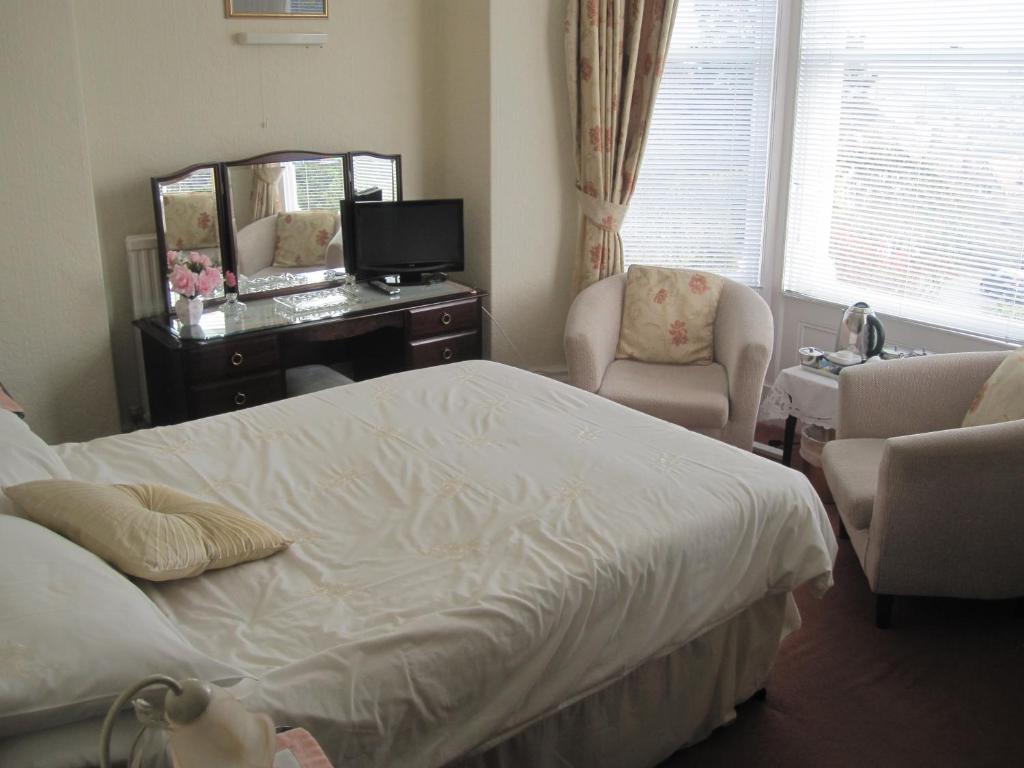 Postel nebo postele na pokoji v ubytování Bron Orme Private Hotel