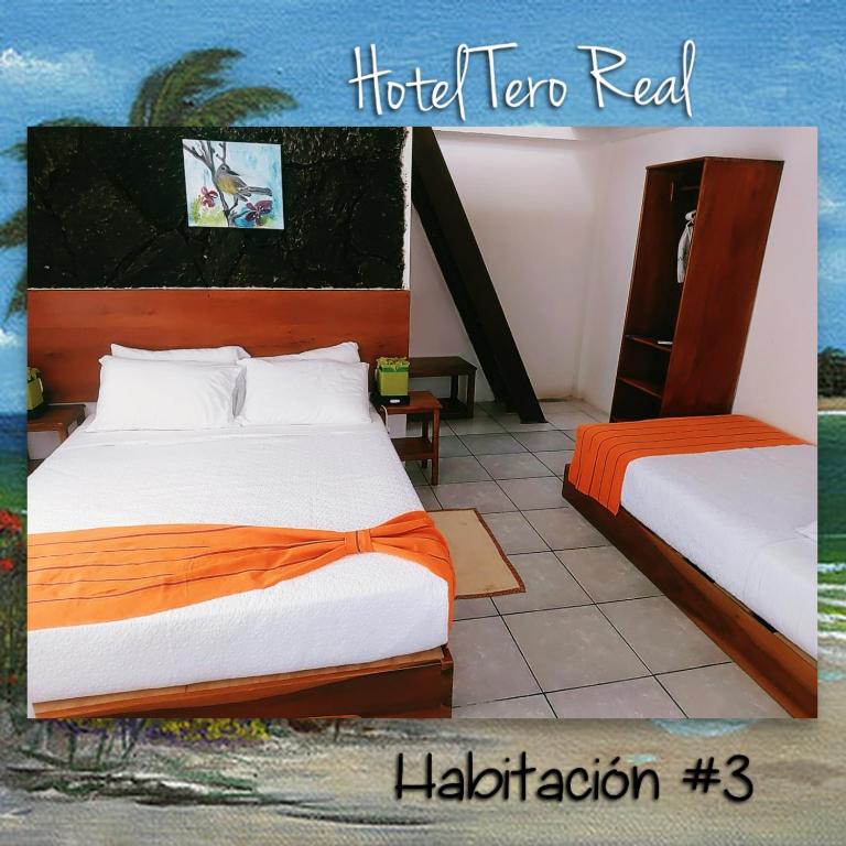 Postel nebo postele na pokoji v ubytování HOSTAL TERO REAL