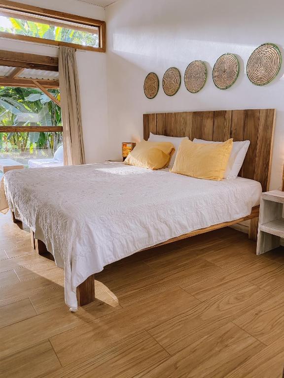 Postel nebo postele na pokoji v ubytování Sonora Jungle & Yoga Retreat