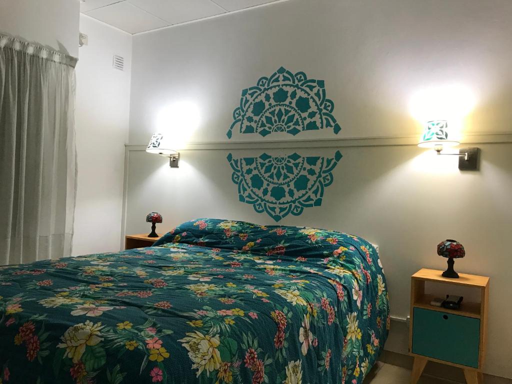 Postelja oz. postelje v sobi nastanitve Mandalas 3, apartamento 2 ambientes