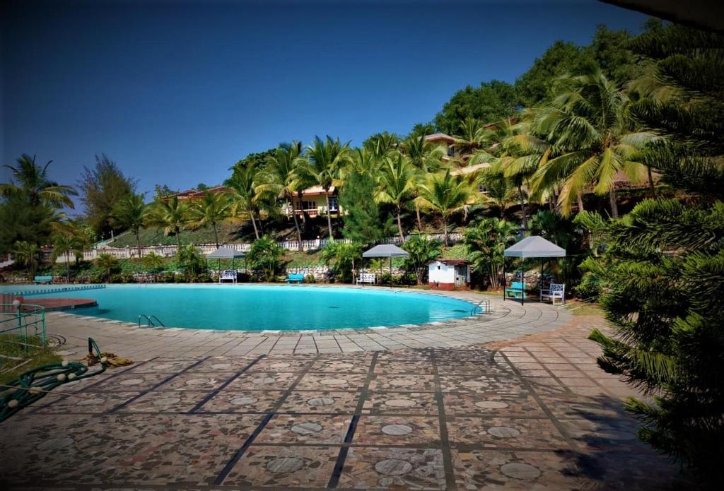 Bazén v ubytování Indismart Woodbourne Resort nebo v jeho okolí