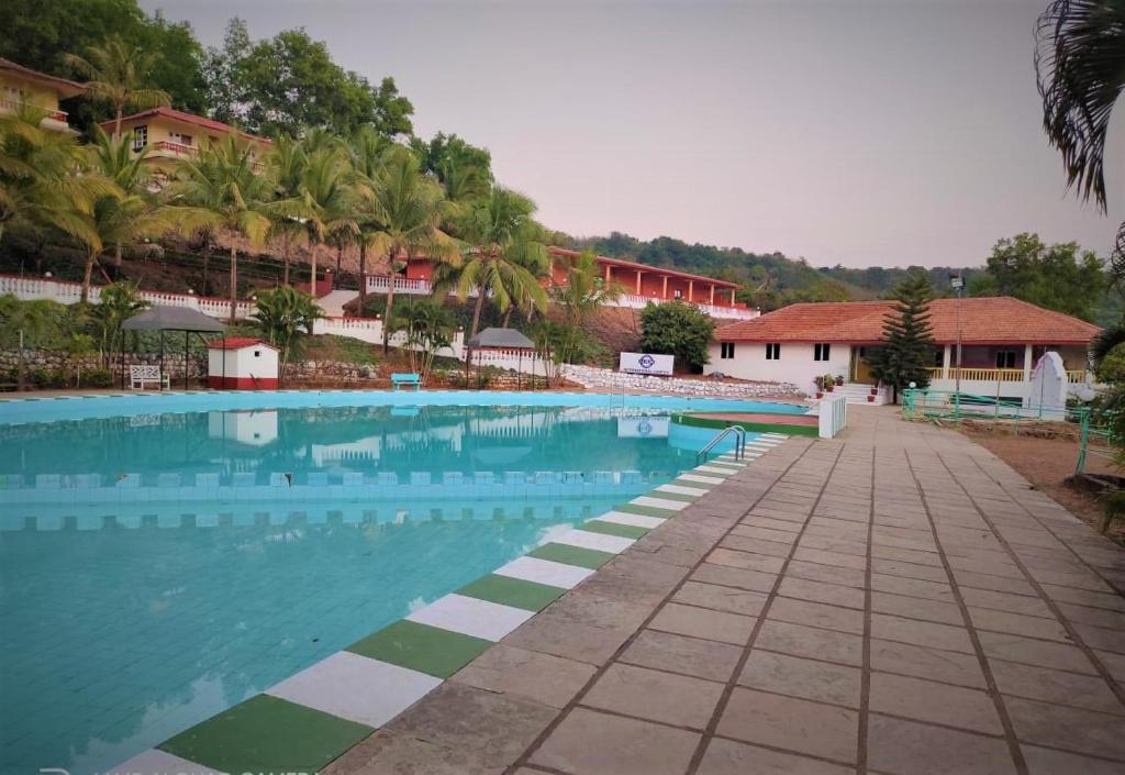 Bazén v ubytování Indismart Woodbourne Resort nebo v jeho okolí