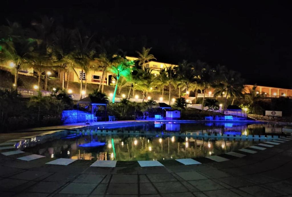 Bazén v ubytování Indismart Woodbourne Resort nebo v jeho okolí