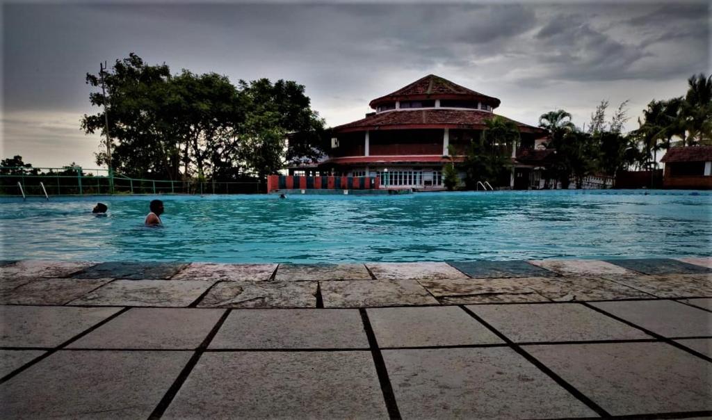 Bazén v ubytování Indismart Woodbourne Resort nebo v jeho okolí