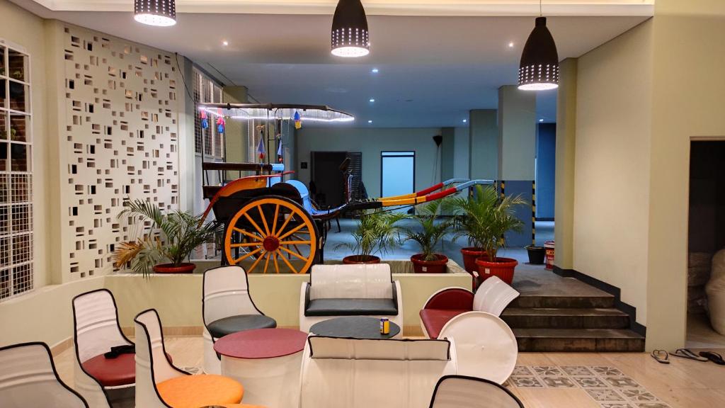 Posezení v ubytování Americano Hotel Syariah Yogyakarta