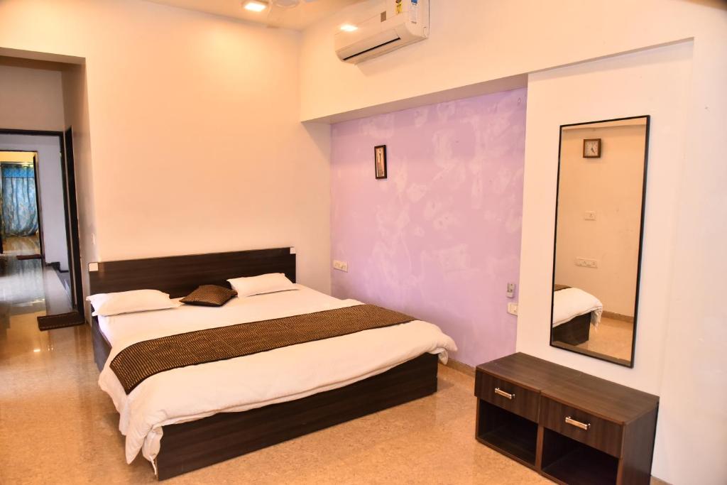 Postel nebo postele na pokoji v ubytování Golden Dreams