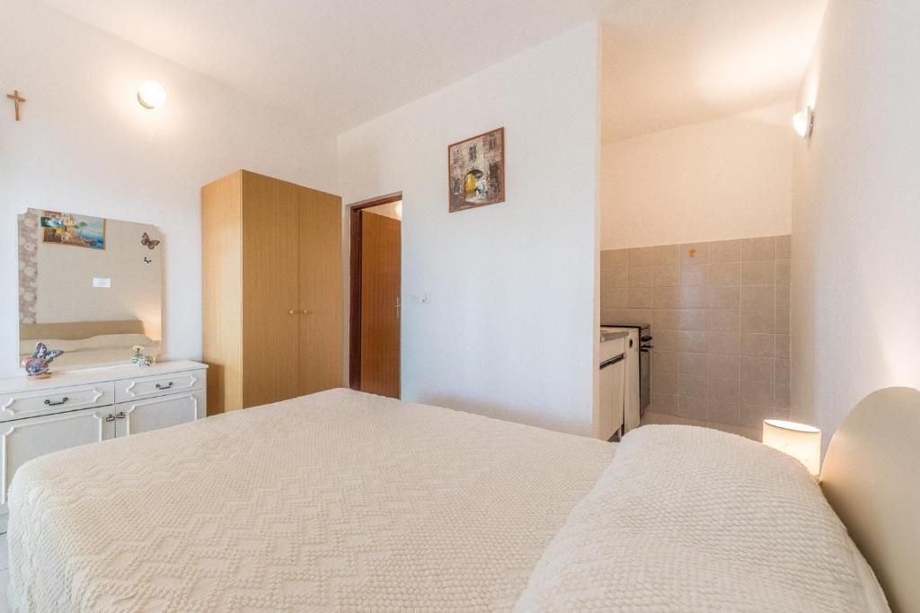 Posteľ alebo postele v izbe v ubytovaní Apartments Blaženka