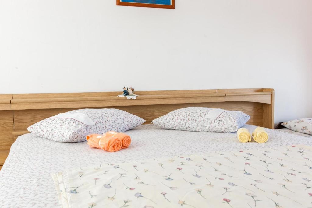 Posteľ alebo postele v izbe v ubytovaní Apartments Blaženka