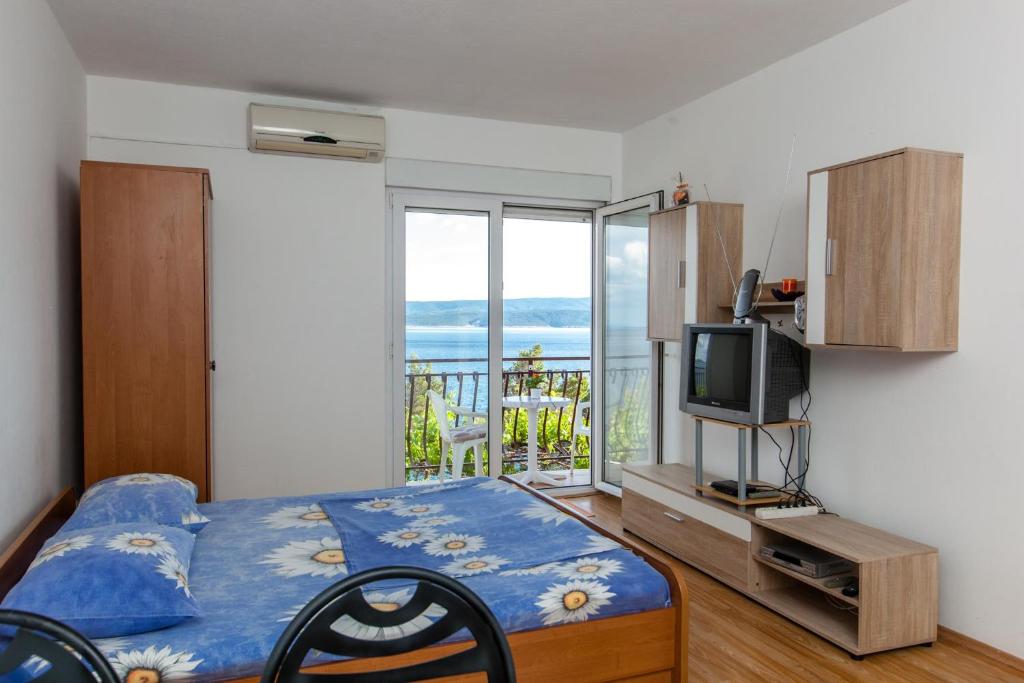 Posteľ alebo postele v izbe v ubytovaní Apartments Blaženka