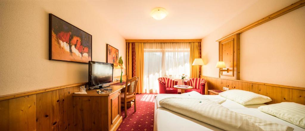 TV a/nebo společenská místnost v ubytování Hotel Alphof Alpbach