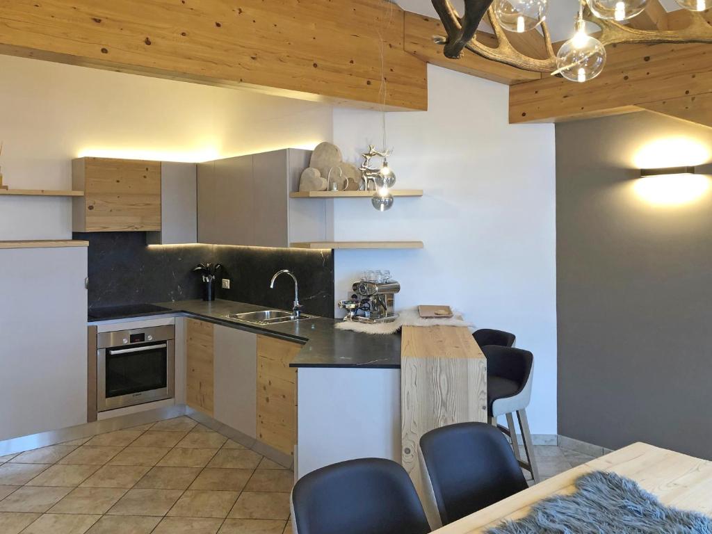 Kuchyň nebo kuchyňský kout v ubytování Attico Faloria Luxury