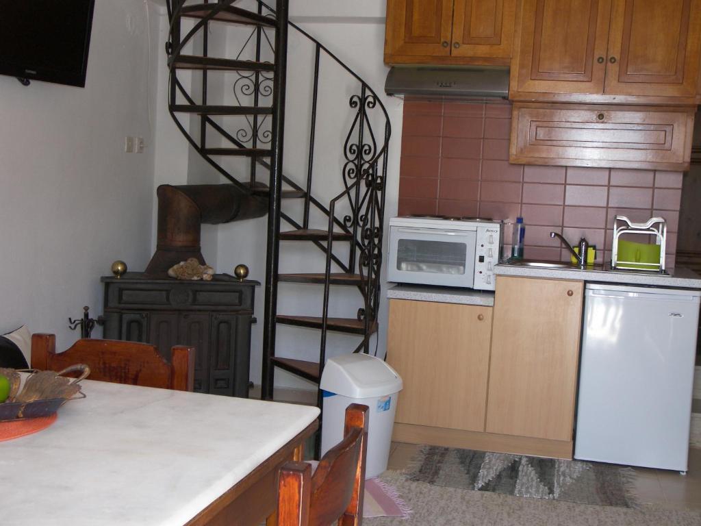 Kuchyňa alebo kuchynka v ubytovaní Hiona Cottage