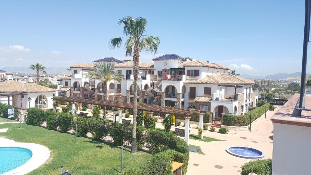 Bazén v ubytovaní Homes of Spain, Al Andalus Residencial JA Apartamento bajo en frente piscina, WIFI alebo v jeho blízkosti
