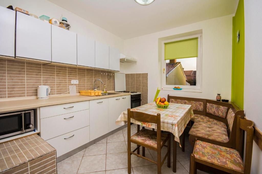 Kuchnia lub aneks kuchenny w obiekcie Apartment Gogić