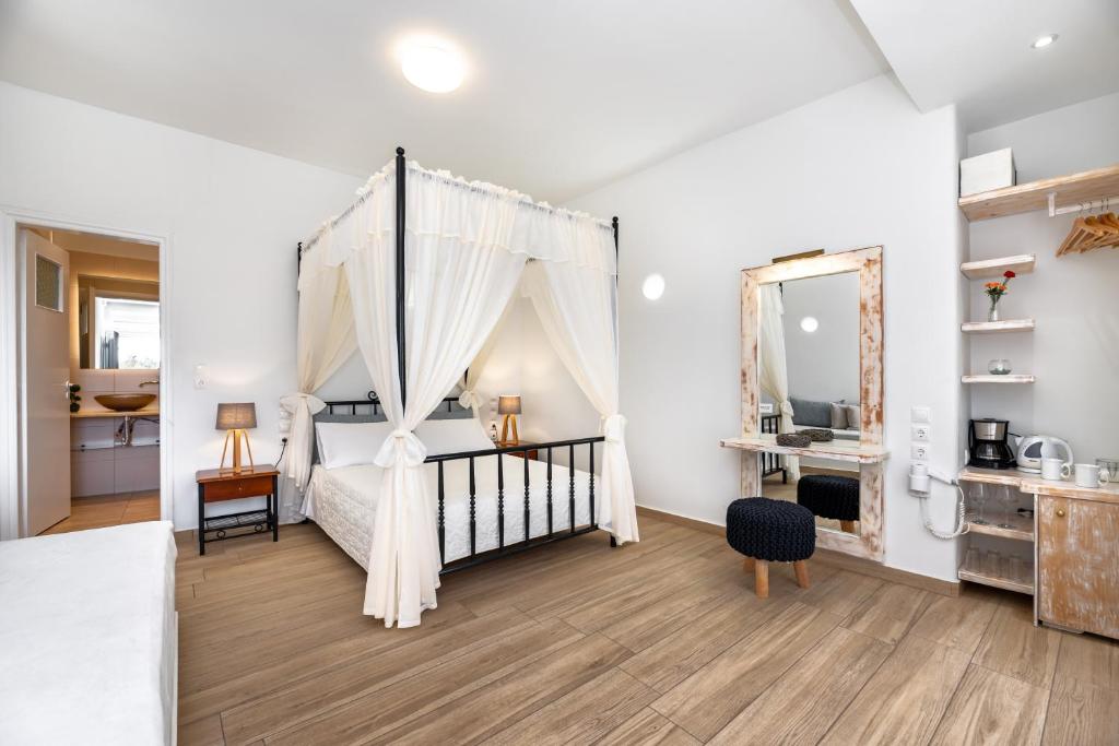 Voodi või voodid majutusasutuse Hotel Thira toas