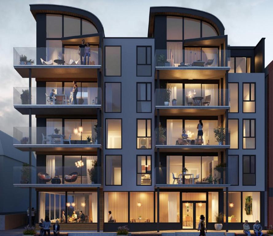 a rendering of a building with people in it at Lofoten Suiteapartments in Svolvær