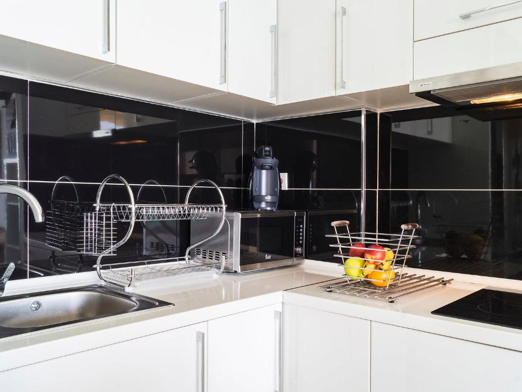 A kitchen or kitchenette at Apartment Castillo de Santa Clara-2 by Interhome
