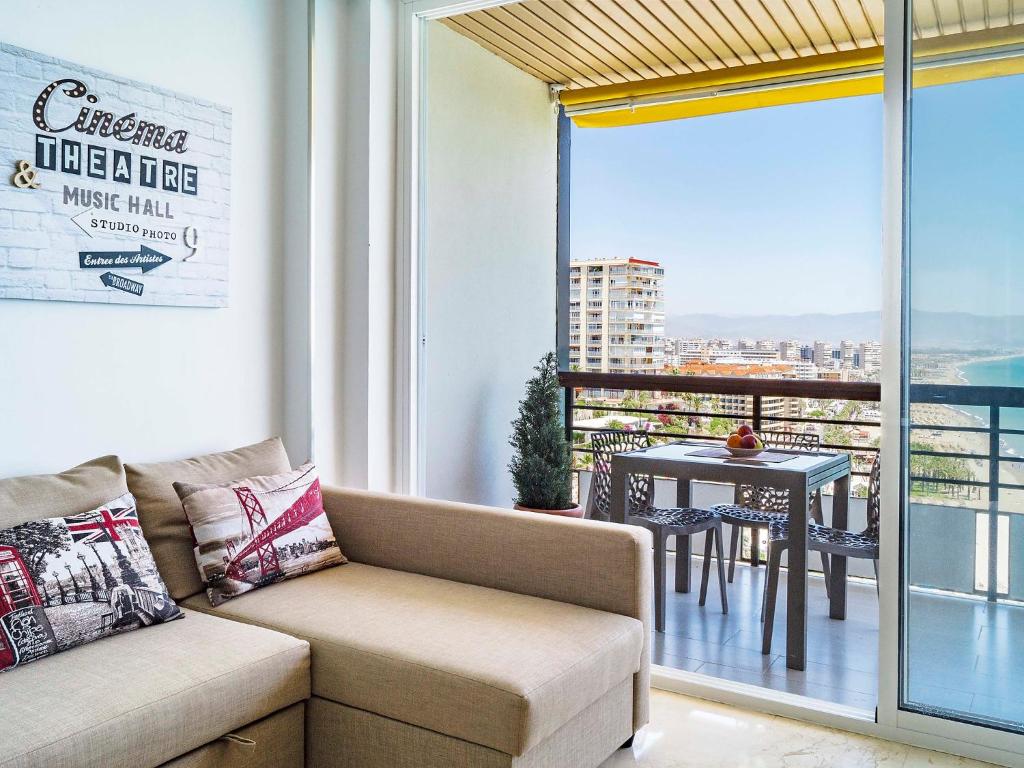 A seating area at Apartment Castillo de Santa Clara-2 by Interhome