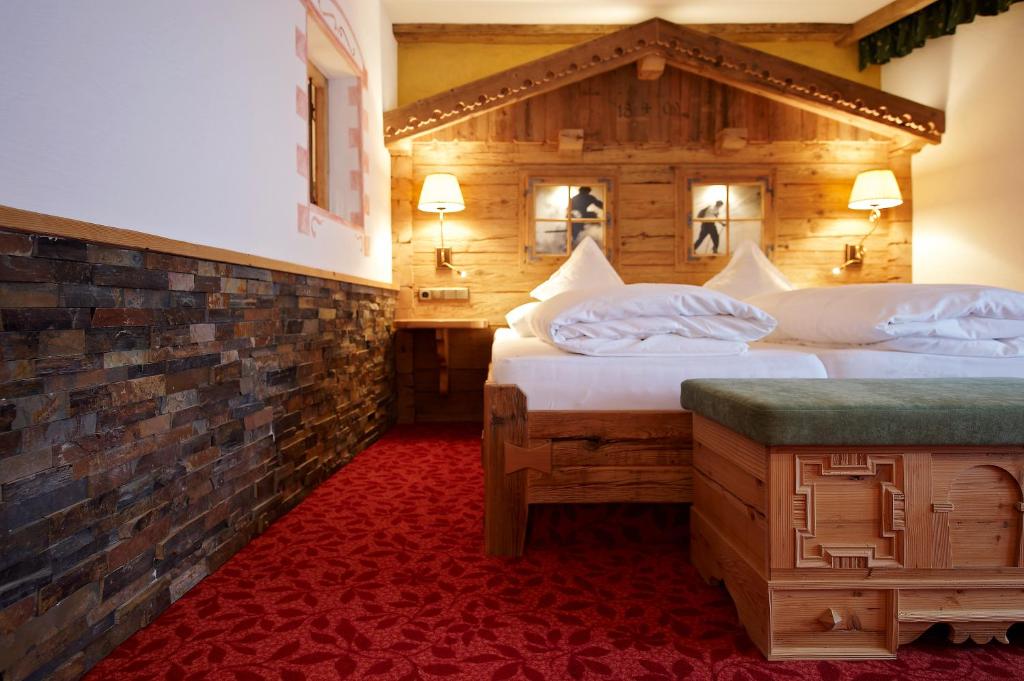 Postel nebo postele na pokoji v ubytování Hotel Solaria Ischgl - 4 superior