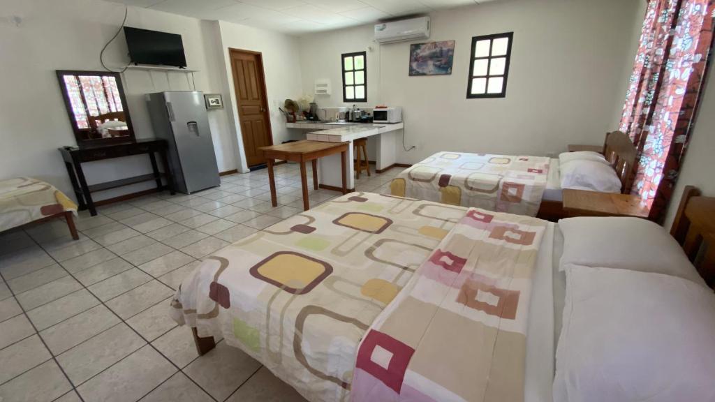 Postel nebo postele na pokoji v ubytování Hotel Moctezuma
