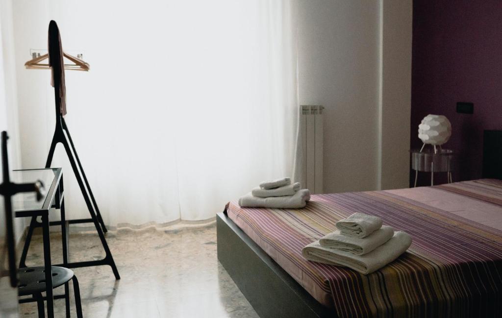 Posteľ alebo postele v izbe v ubytovaní La Casa Di Adua