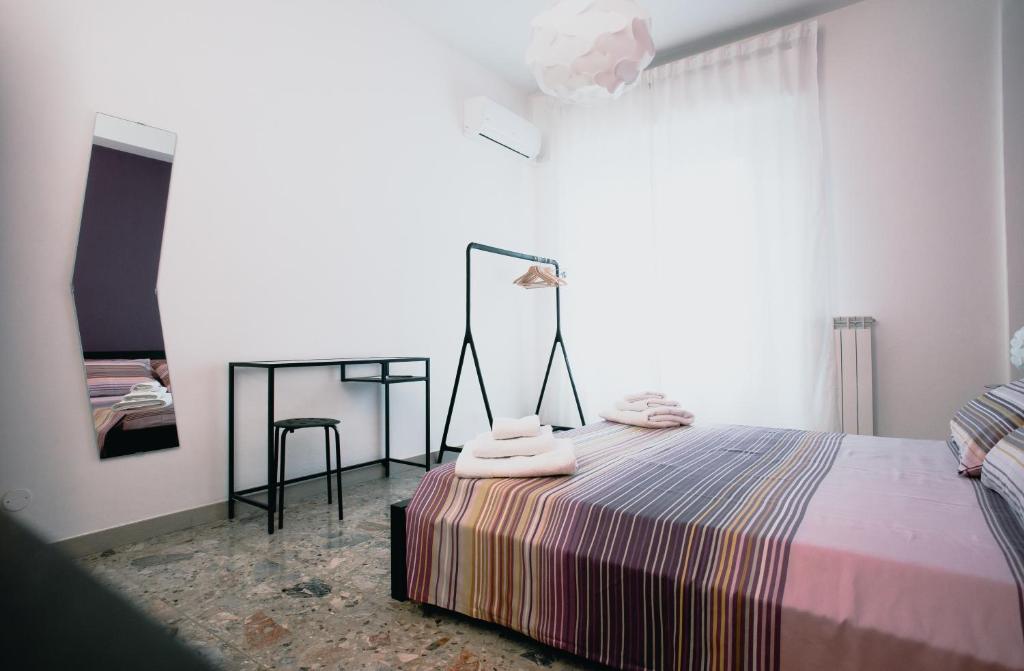 Posteľ alebo postele v izbe v ubytovaní La Casa Di Adua