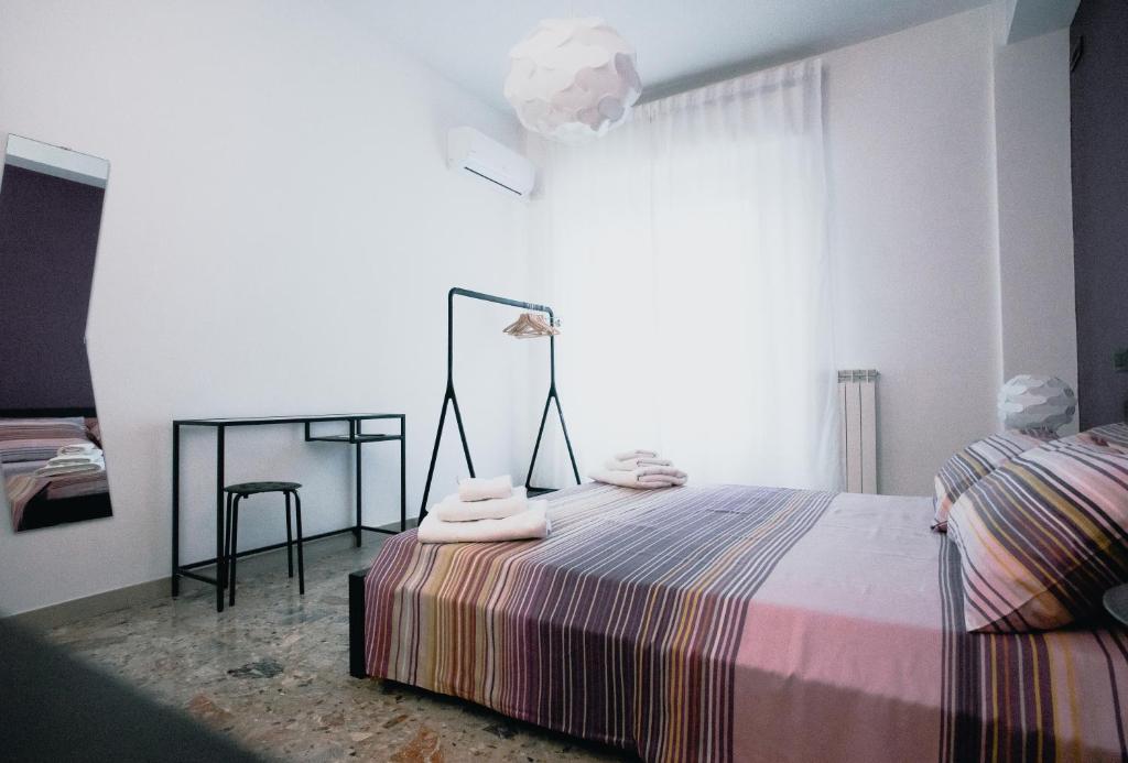 Posteľ alebo postele v izbe v ubytovaní La Casa Di Adua