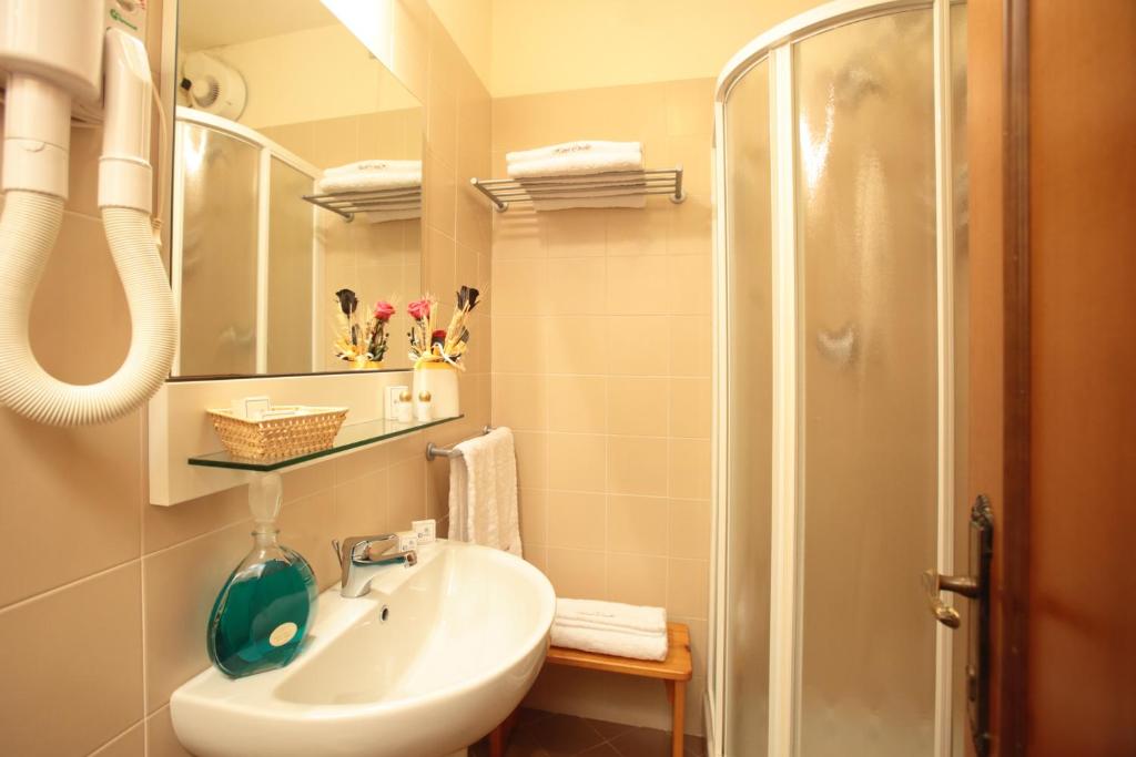 Koupelna v ubytování Hotel Corallo