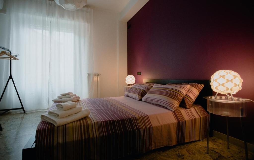 Posteľ alebo postele v izbe v ubytovaní La Casa Di Adua