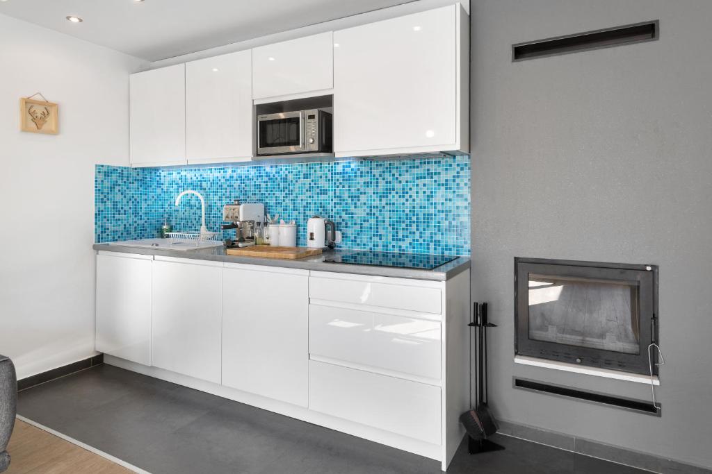 Kuchyňa alebo kuchynka v ubytovaní Apartament Scandinavia