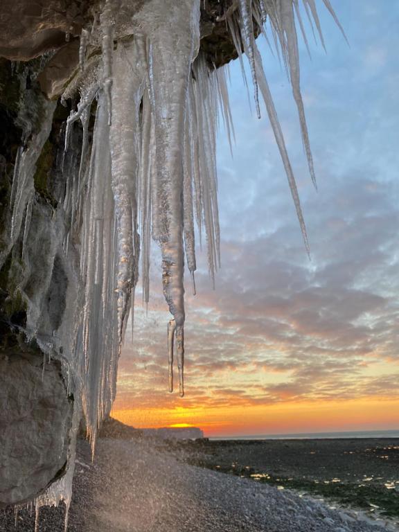 an image of icicles hanging from a cliff at Chalet les falaises in Saint-Léonard