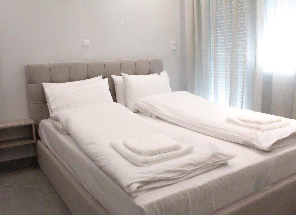 מיטה או מיטות בחדר ב-Apartment Ori