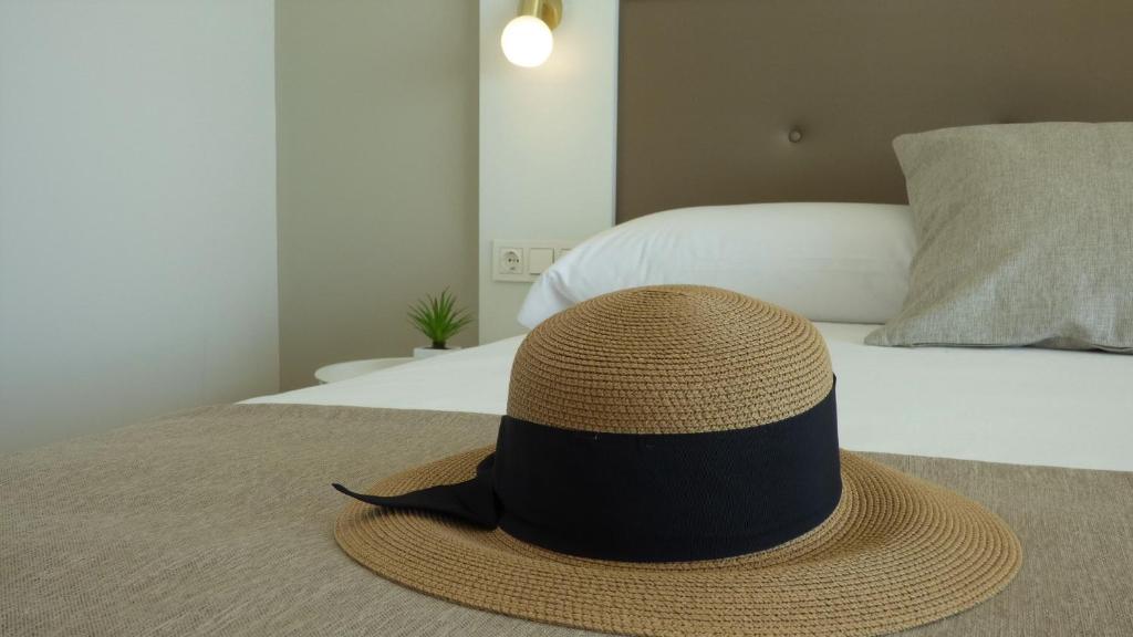 A bed or beds in a room at Apartamentos Maren