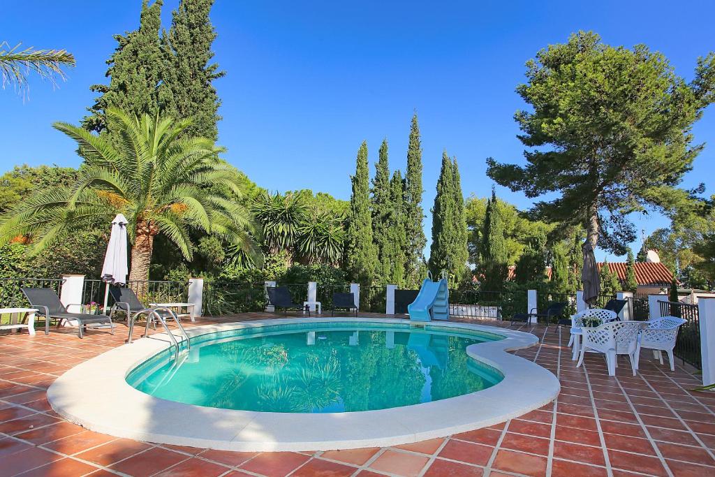 The swimming pool at or close to Villa El Hogar