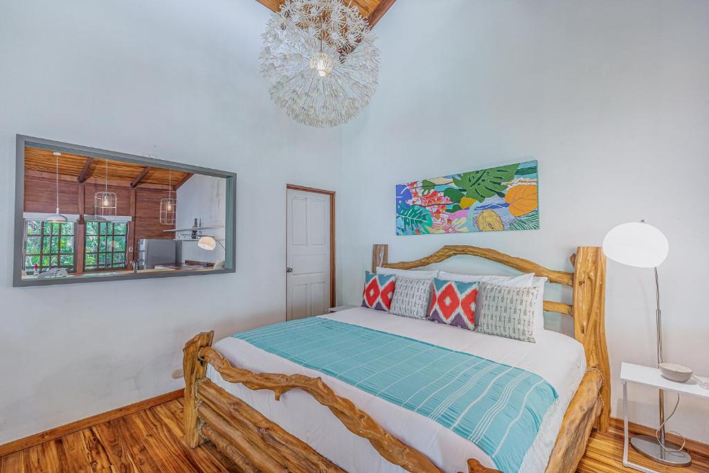 Postel nebo postele na pokoji v ubytování Hotel Guiones