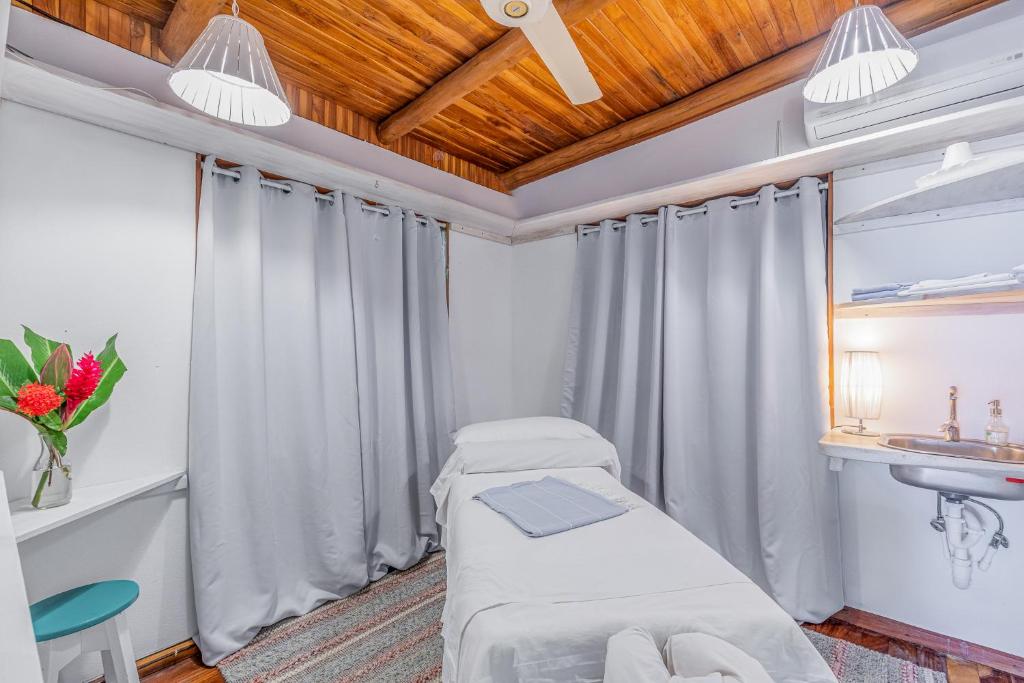 Postel nebo postele na pokoji v ubytování Hotel Guiones