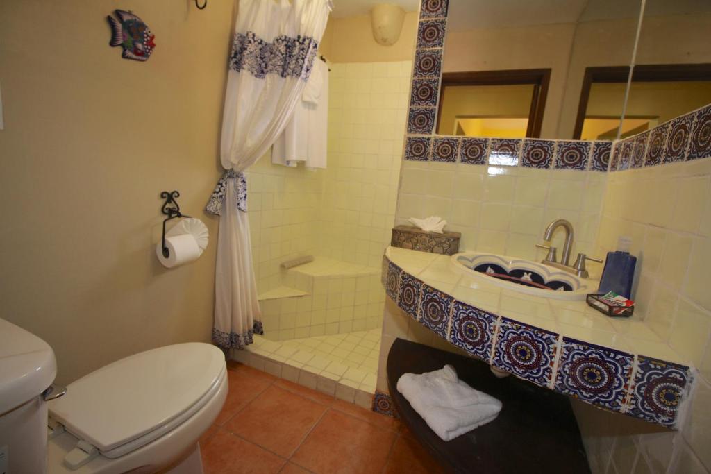 Koupelna v ubytování Casa Mia Suites
