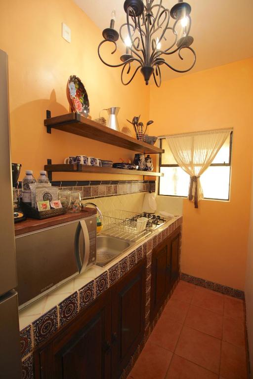 Kuchyň nebo kuchyňský kout v ubytování Casa Mia Suites