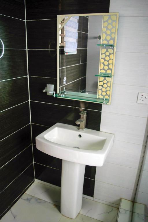 Koupelna v ubytování Ocean Park Hotel,Lekki phase 1