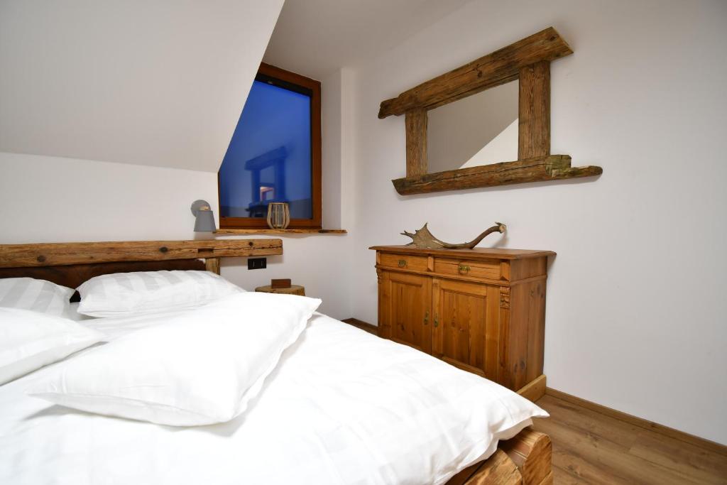 Postel nebo postele na pokoji v ubytování Chalet Apartments Maštal