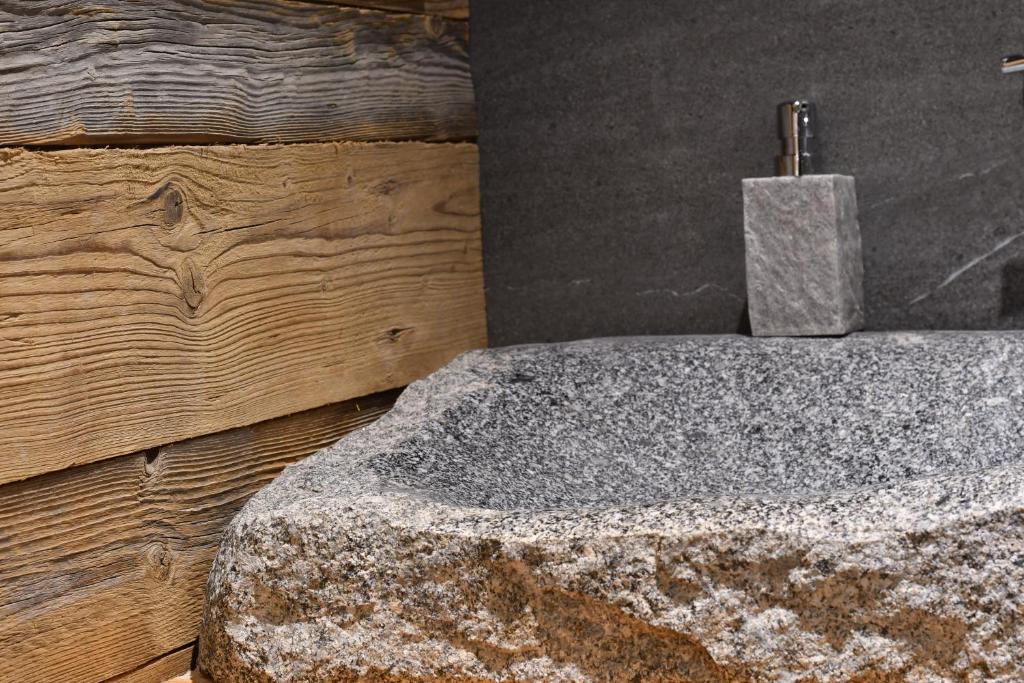 Postel nebo postele na pokoji v ubytování Chalet Apartments Maštal