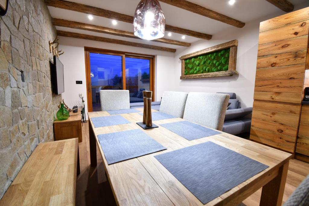 Postel nebo postele na pokoji v ubytování Chalet Apartments Maštal