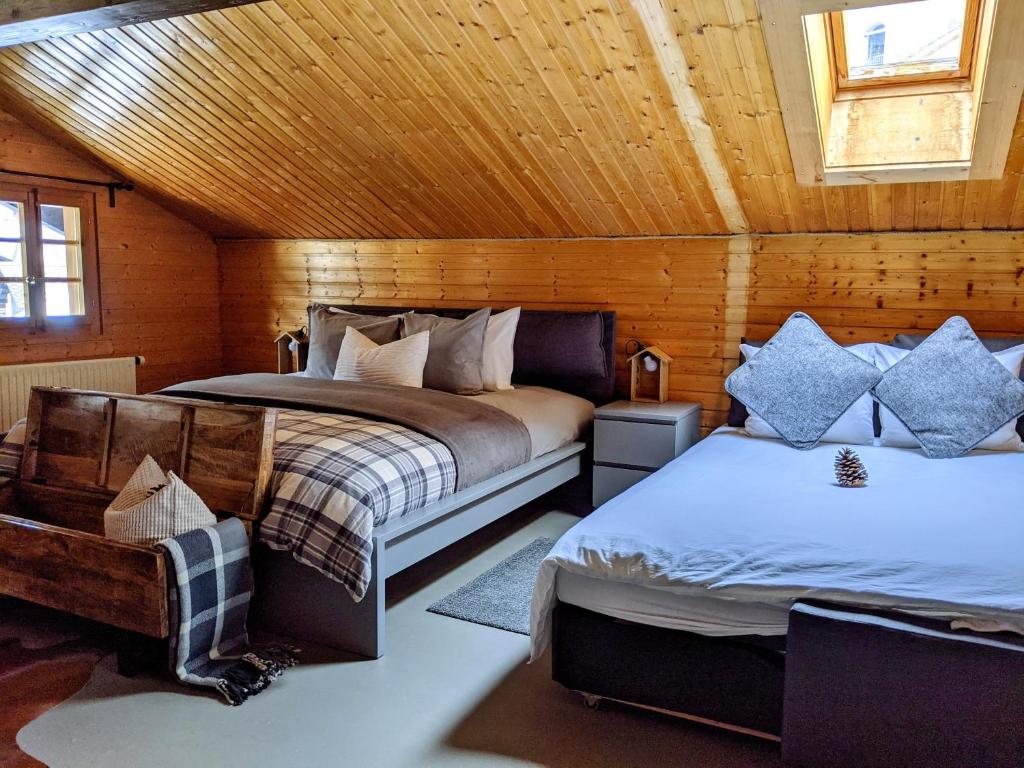 Postel nebo postele na pokoji v ubytování Relais des Mélèzes