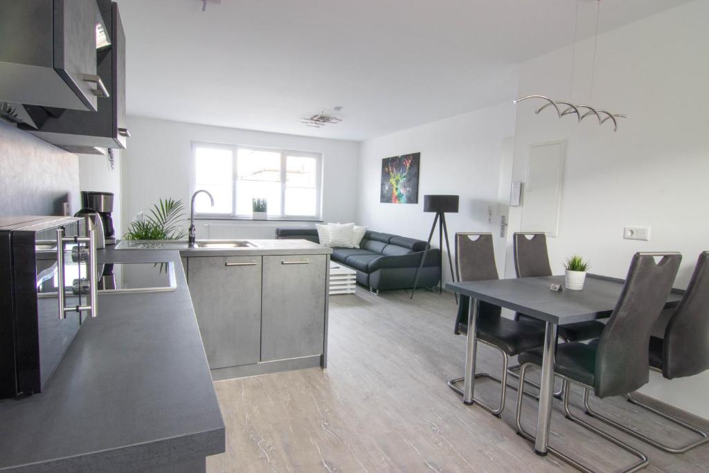Kuchyň nebo kuchyňský kout v ubytování Appartements am Bodetal